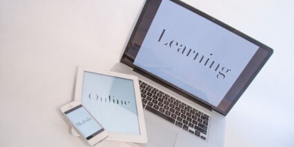 A phone, iPad, and laptop.