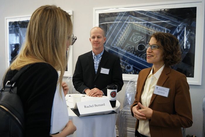 History PhDs Michael Hill (ETS) and Rachel Bernard (right, of the ACLS) advise a “High-Stakes History” attendee about careers. Caroline Marris