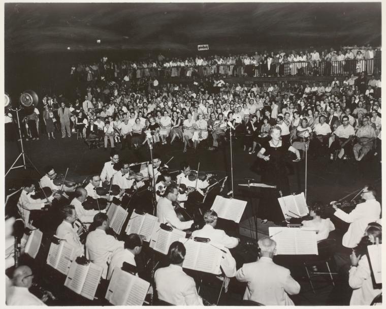 Classical music critics often depend on the same skills as historians, including being able to place a classical music performance in its historical context. Avra Petrides/Wikimedia Commons/CC BY-SA 3.0